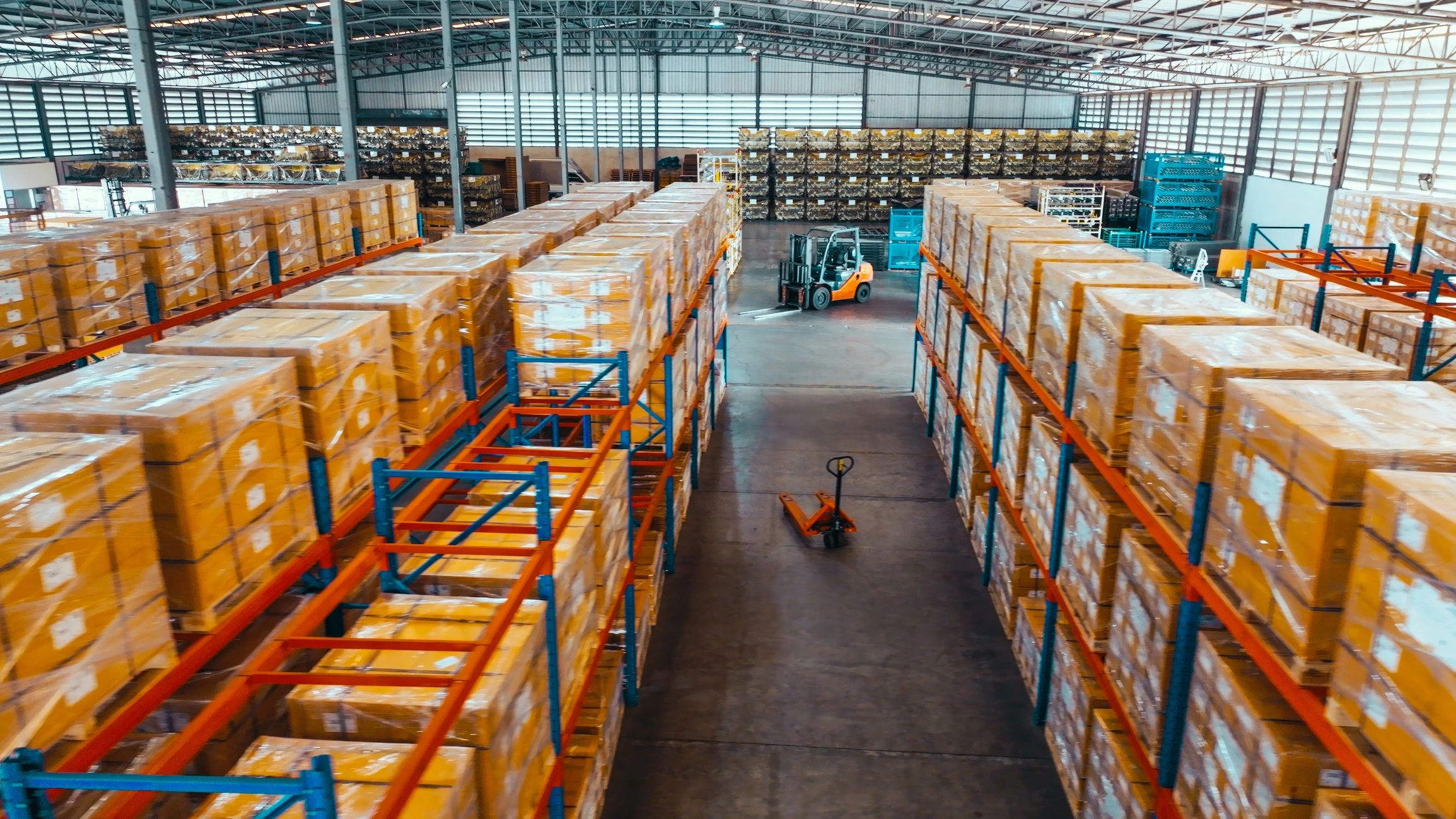 Warehouse shelving and packaged goods representing secure B2B distribution operations